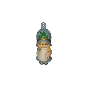 Vintage holiday girl and her dolly Christmas ornament